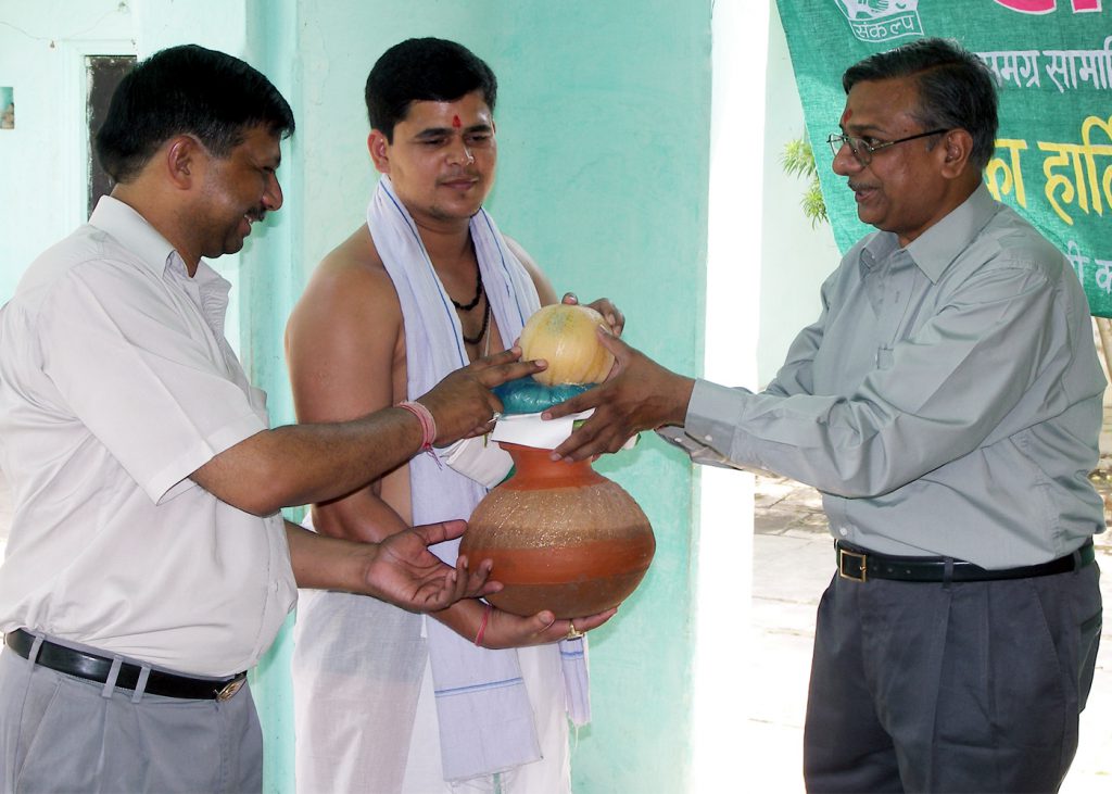 Donating Ghat,Fruit and Muddra to Bhramin On account of Akchay Tritiya.