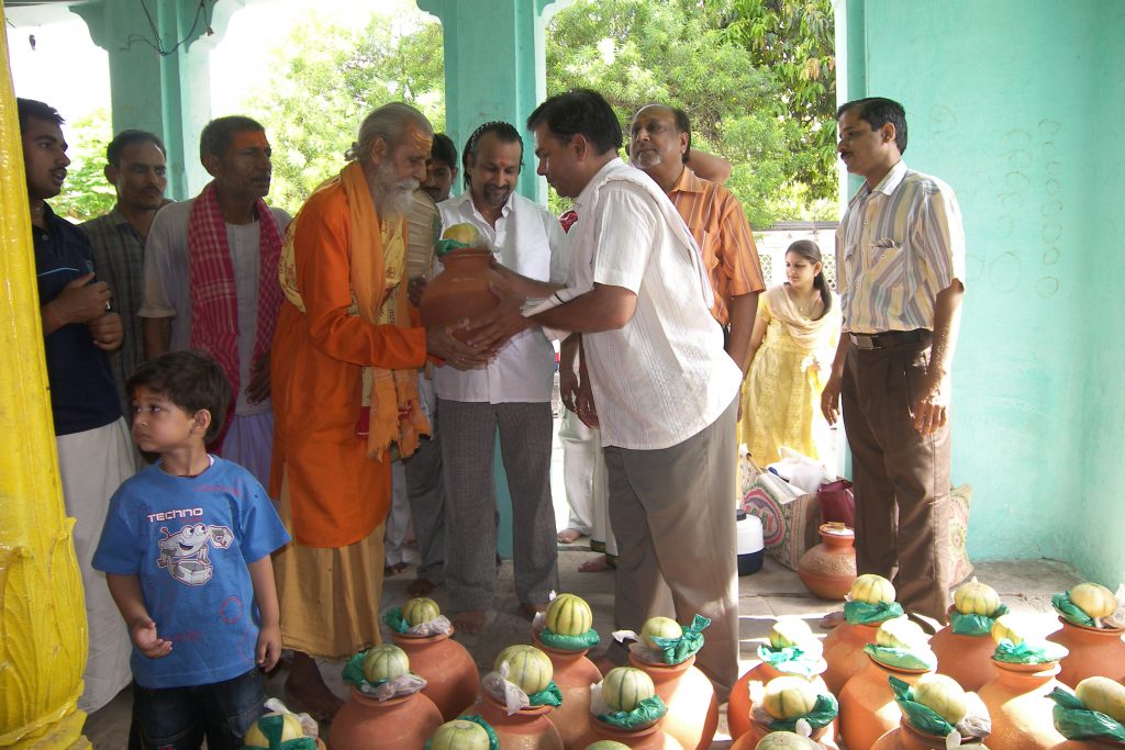 Donating Ghat,Fruit and Muddra to Bhramin On account of Akchay Tritiya.