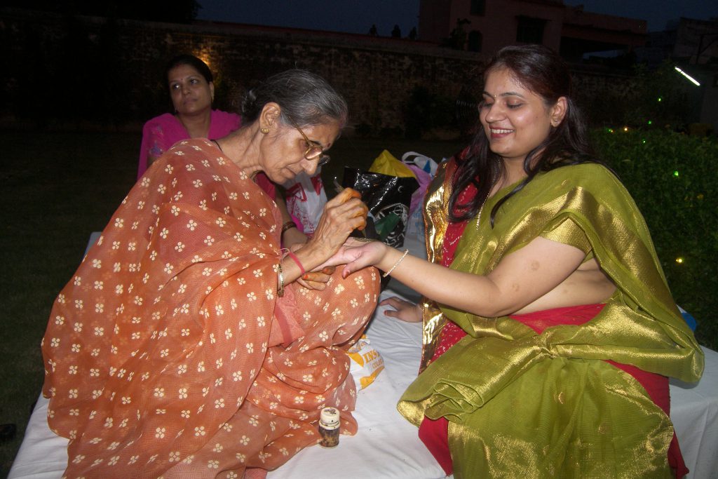 Mehndi decoration in teej utsav.