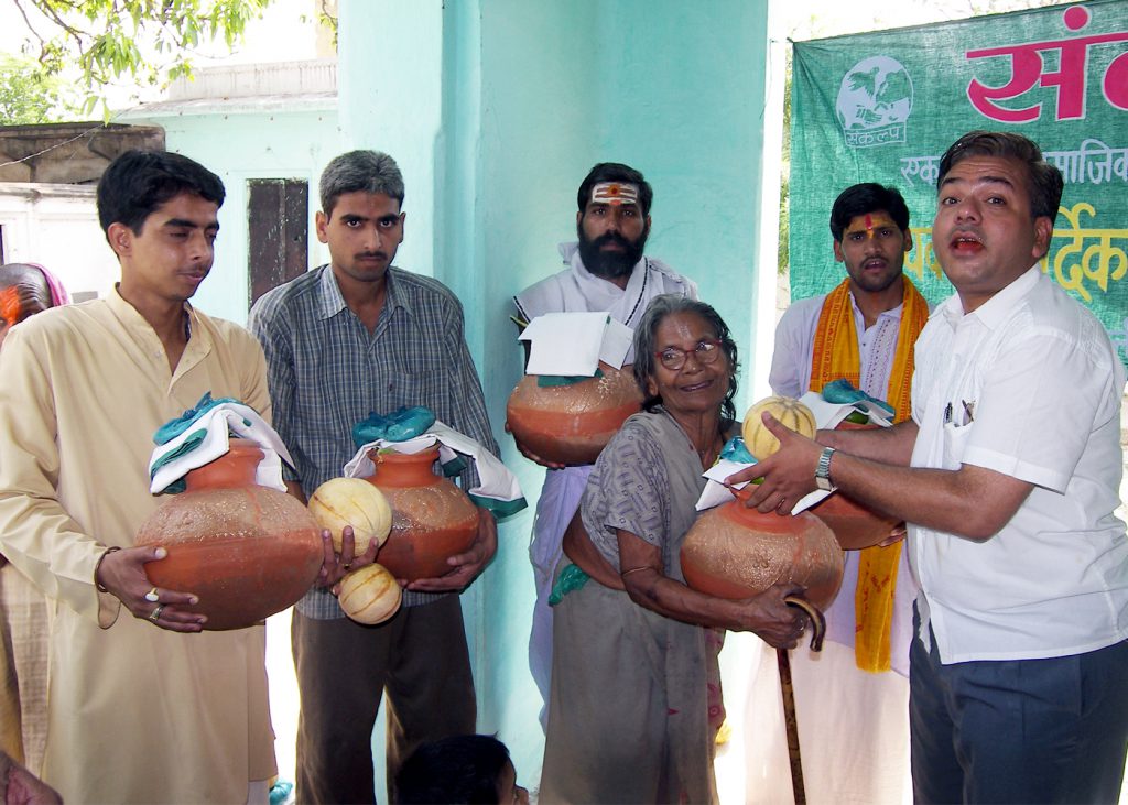 Donating Ghat,Fruit and Muddra to Bhramin On account of Akchay Tritiya.