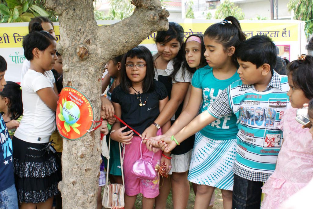 Friendship Day celebration with tree.