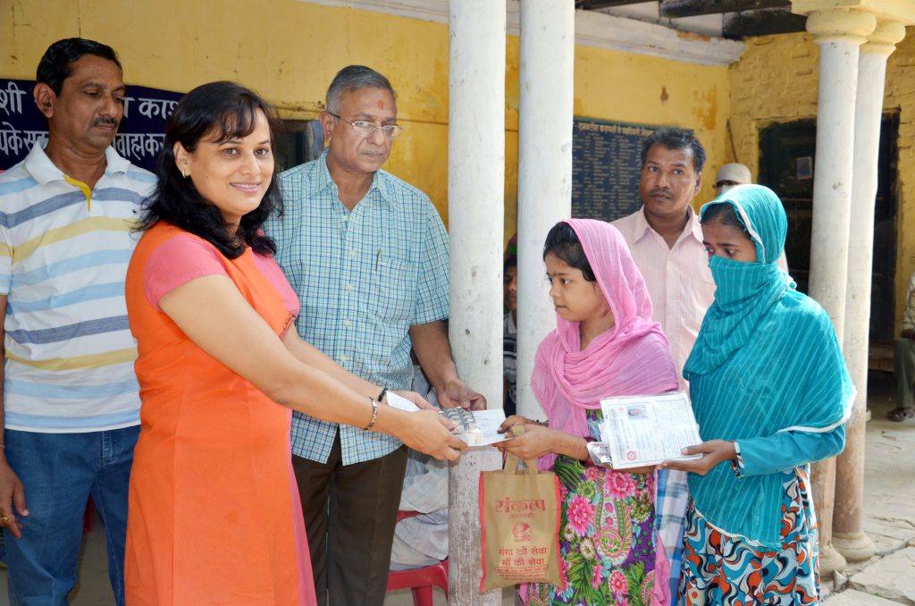 Medicine distribution By  Nilu Mishra (Athlete)