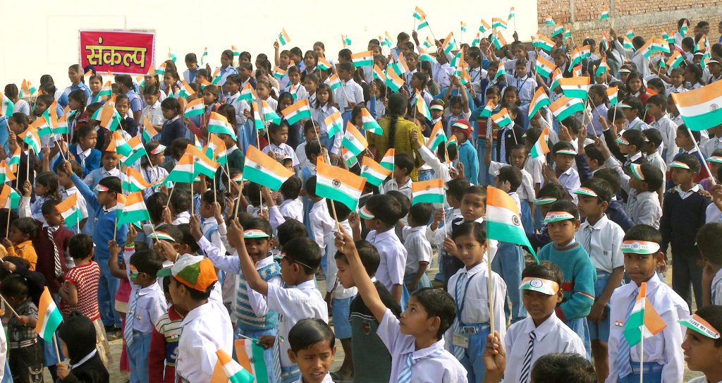 Distribution of cloth bag instead of plastic flag on occasion  of Republic Day among the children of schools.