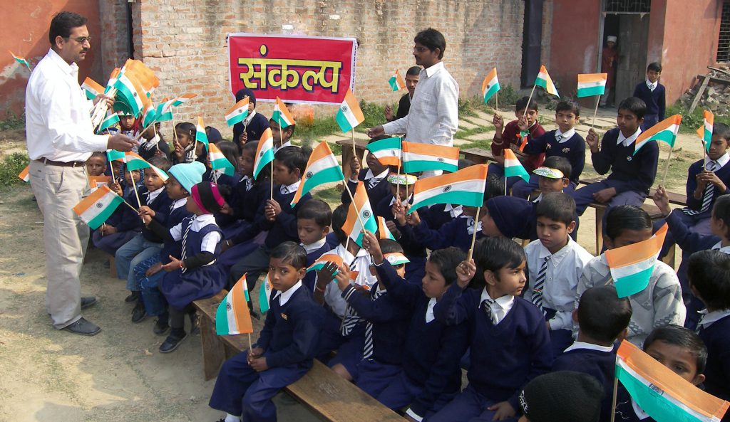 Distribution of cloth bag instead of plastic flag on occasion  of Republic Day among the children of schools.