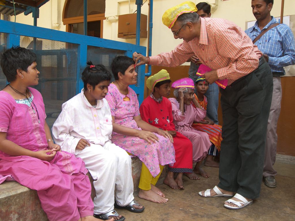 Celebrating Holi with helpless old people's of Mother Teresa  Home, Shivala Varanasi.