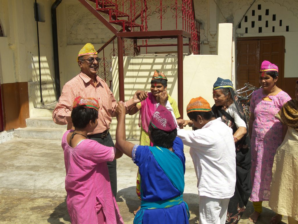 Celebrating Holi with helpless old people's of Mother Teresa  Home, Shivala Varanasi.