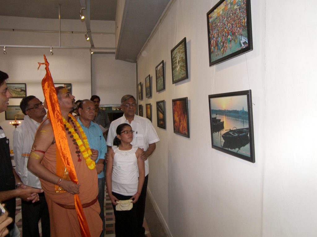 Swami Avimukteshwera Nand Maharaj ji having a look at the exhibition ..