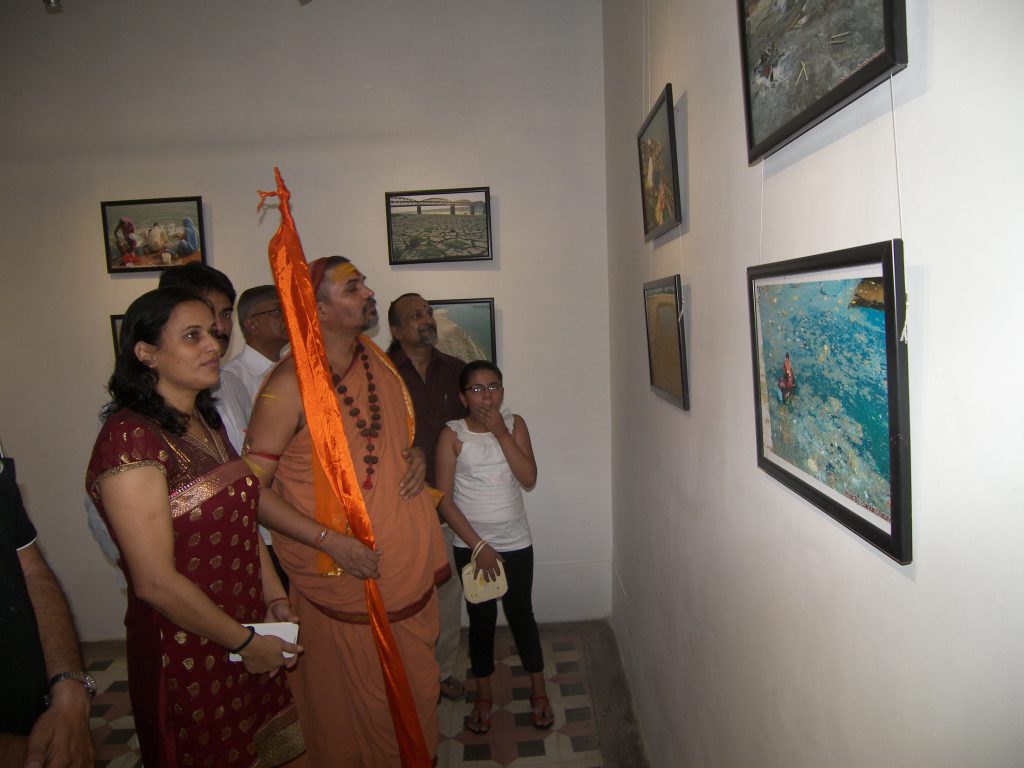 Swami Avimukteshwera Nand Maharaj ji & Athlete Nilu Mishra ji having a look at the exhibition .