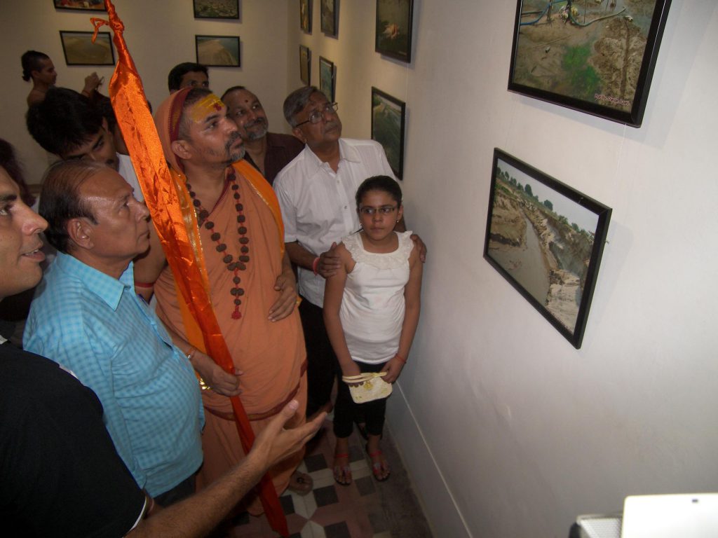 Swami Avimukteshwera Nand Maharaj ji having a look at the exhibition ..