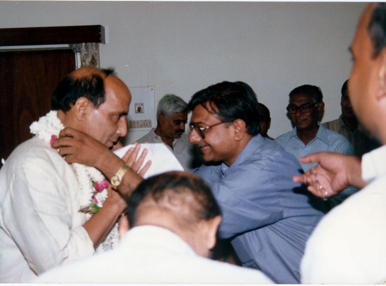 Mr. Anil Kumar Jain (President U.P Prabandhak Maha-sabha) honoring Mr. Rajnath Singh .